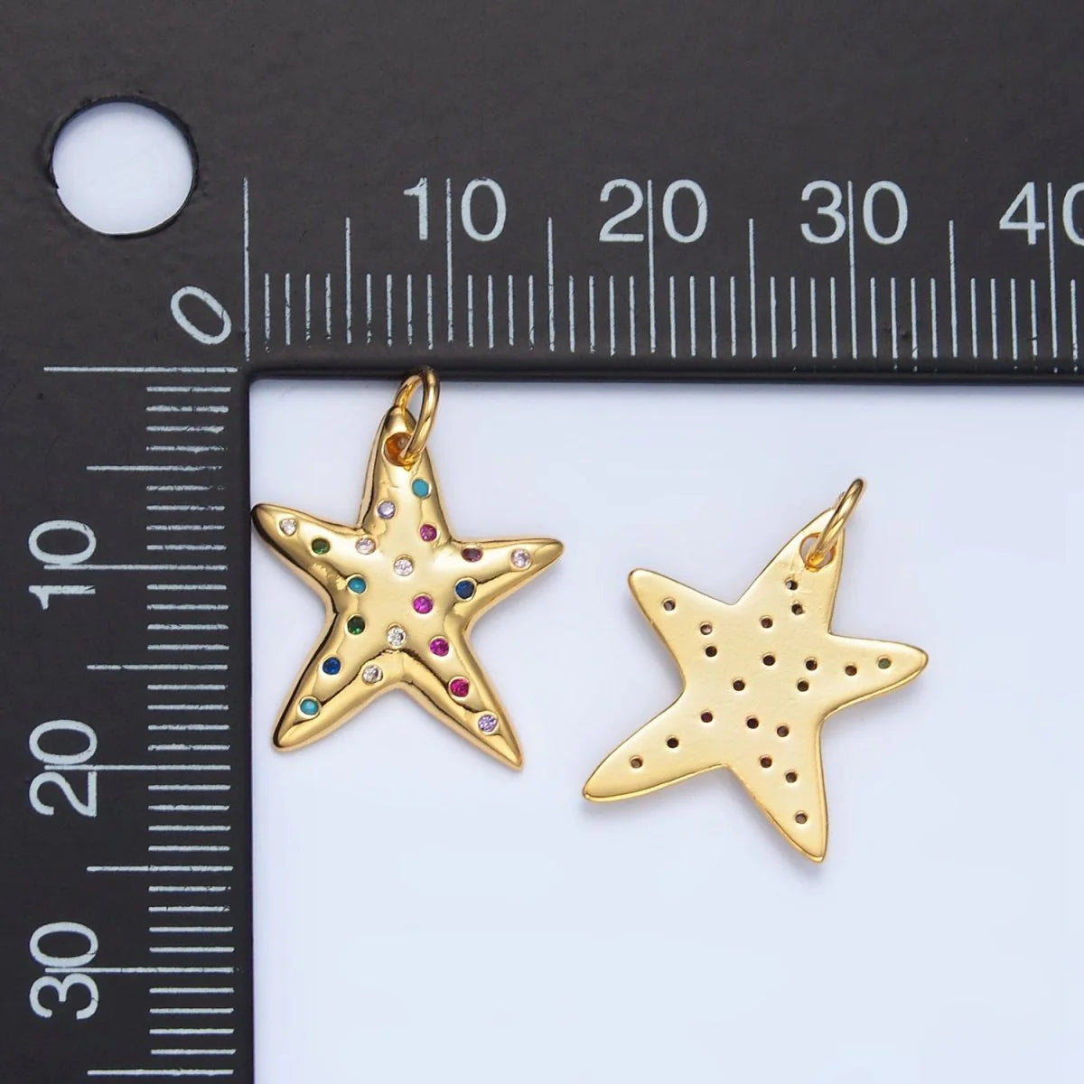 GOLD STAR WITH STONES CHARM