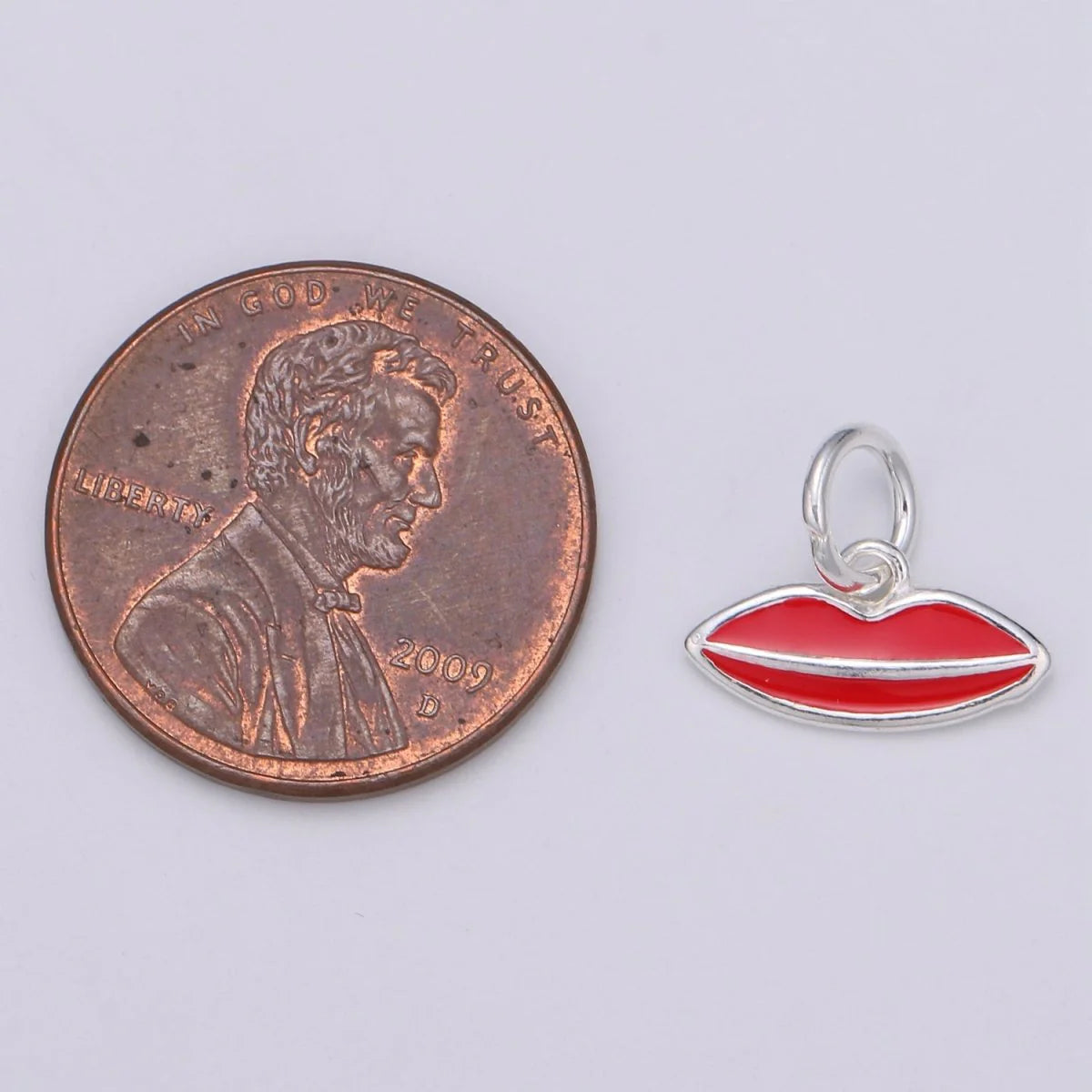 STERLING SILVER AND RED LIP CHARM