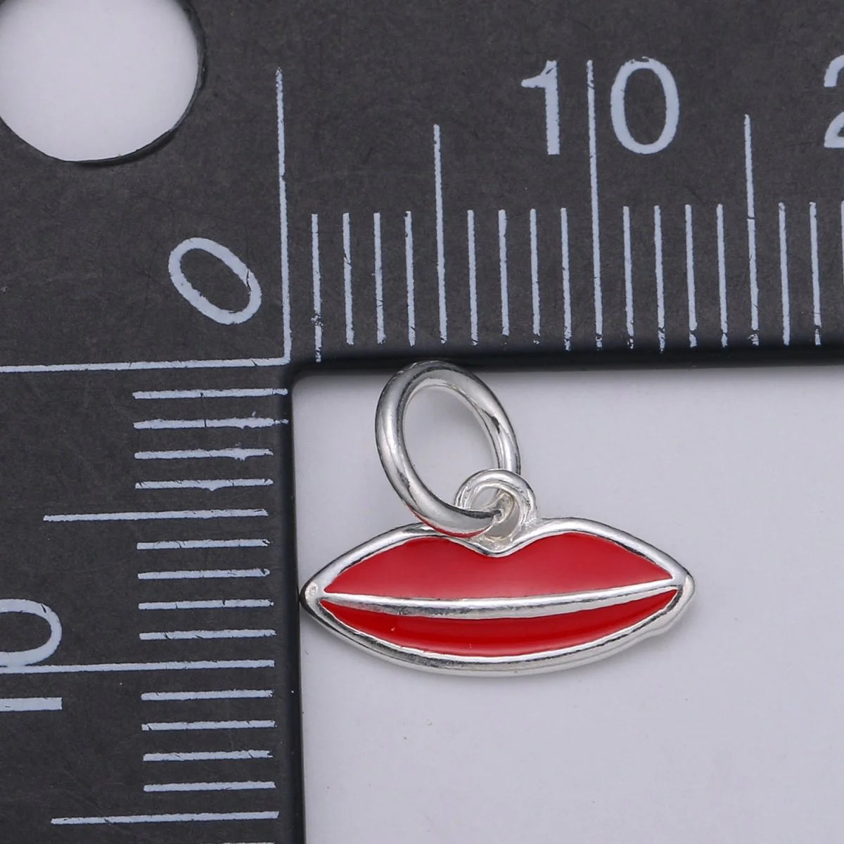 STERLING SILVER AND RED LIP CHARM